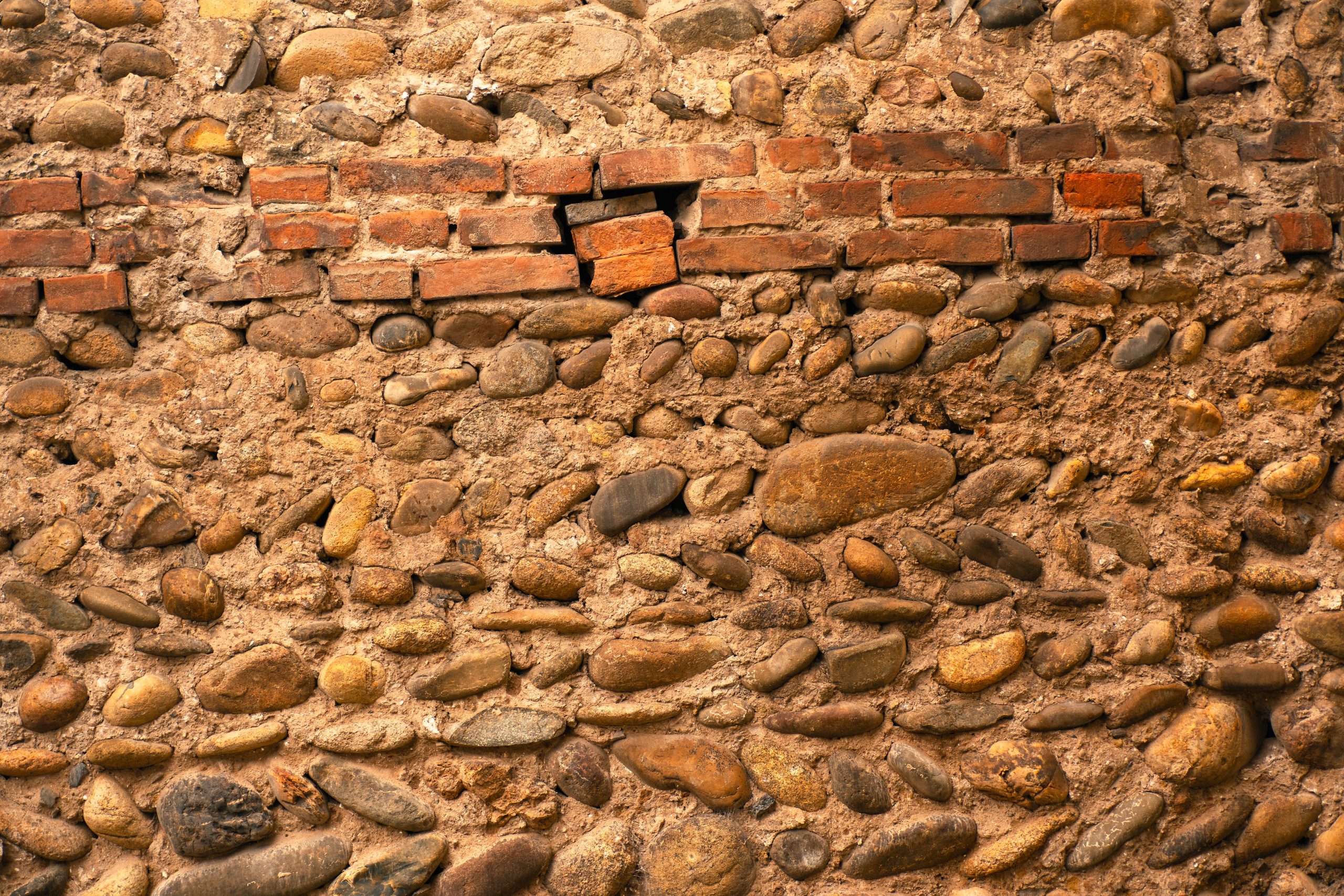Mur rustique moellons brique textures couleurs naturelles